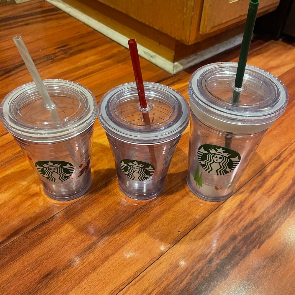 Starbucks Clear Tumblers with Red, Green, and White Straws. 4 cups in number